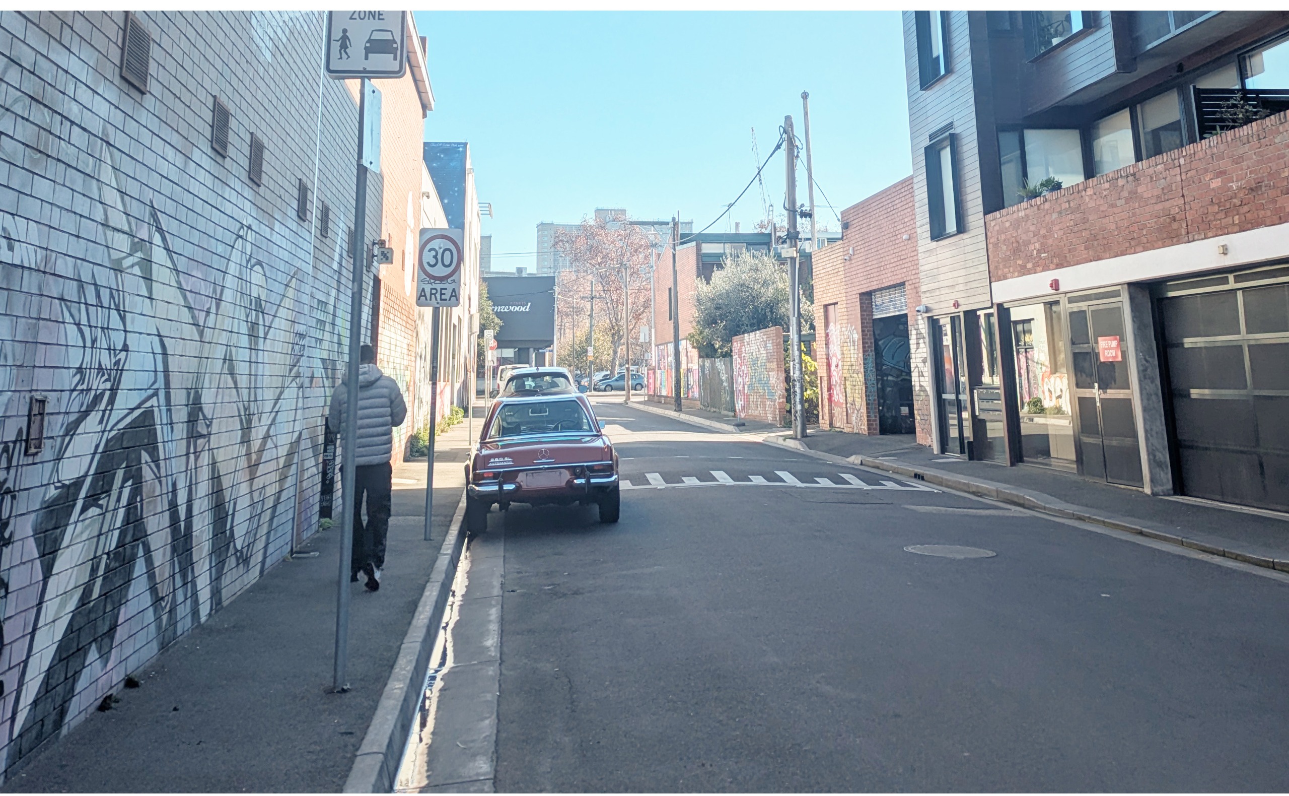 Existing Rose Street: Photo showing current conditions of Rose Street between Nicholson and Spring Street